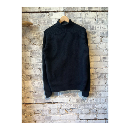 Men's reversible foggy mock sweater in navy, with a textured fabric and casual fit, shown folded with the collar and sleeves visible.
