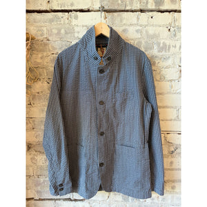 Men's navy and blue seersucker Tropical Trap blazer by Relwen, featuring a lightweight, tailored design with notch lapels.