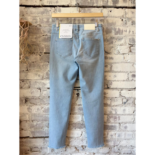 Light blue women's Baker Slim Jean by Closed Women's, showing a close-up of the fitted denim and stitching details.