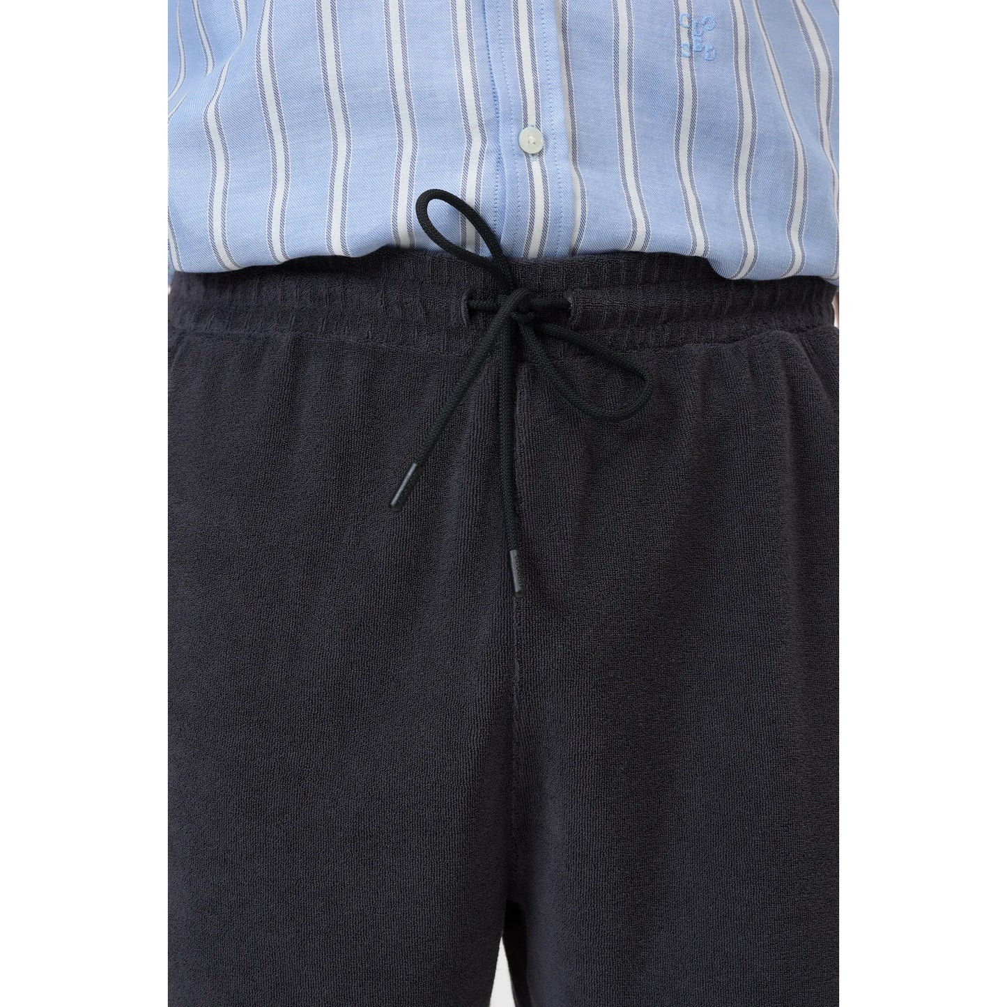 Men's Terry Cloth Shorts in Magma Black by Closed Men's, showing a comfortable, casual fit with a relaxed waistband.