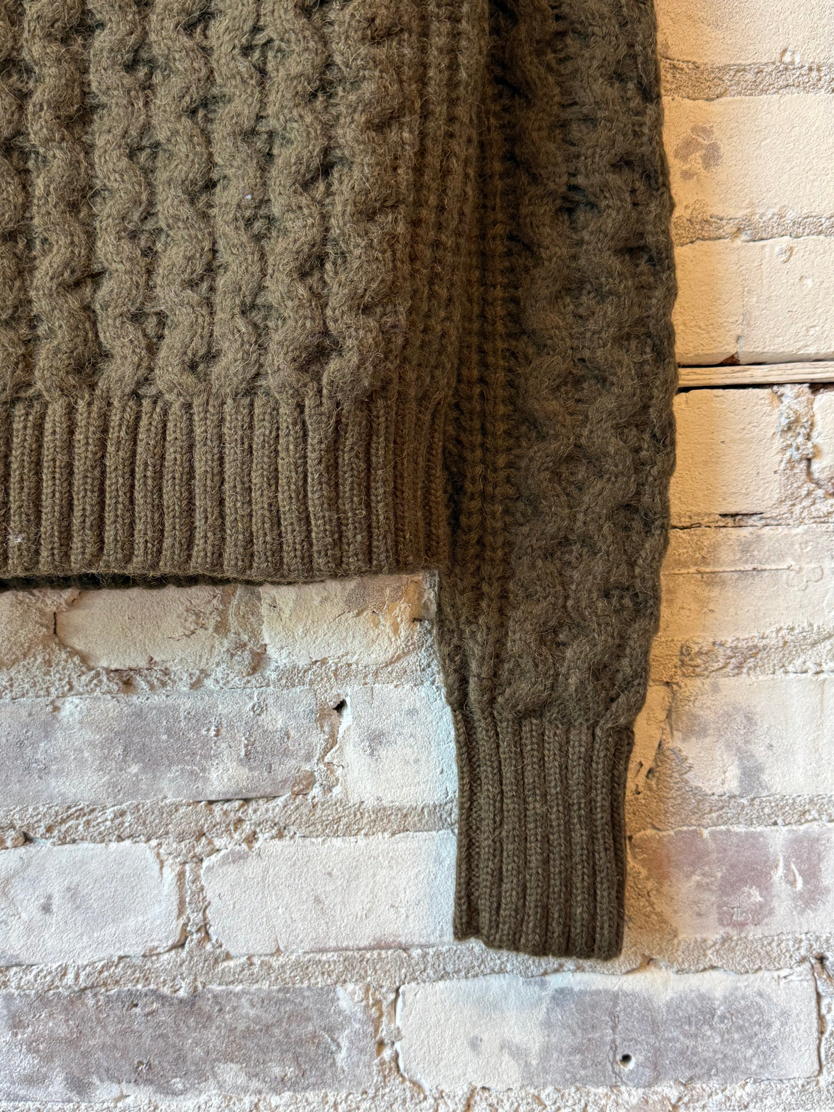 Women's Amara Sweater in dark olive by ELEVEN SIX, featuring a cozy knit design and long sleeves.