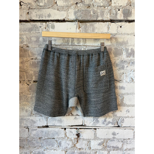 Men's gray Raffy fleece sweat shorts by Kepani, showing the soft fabric and comfortable fit in a casual style.