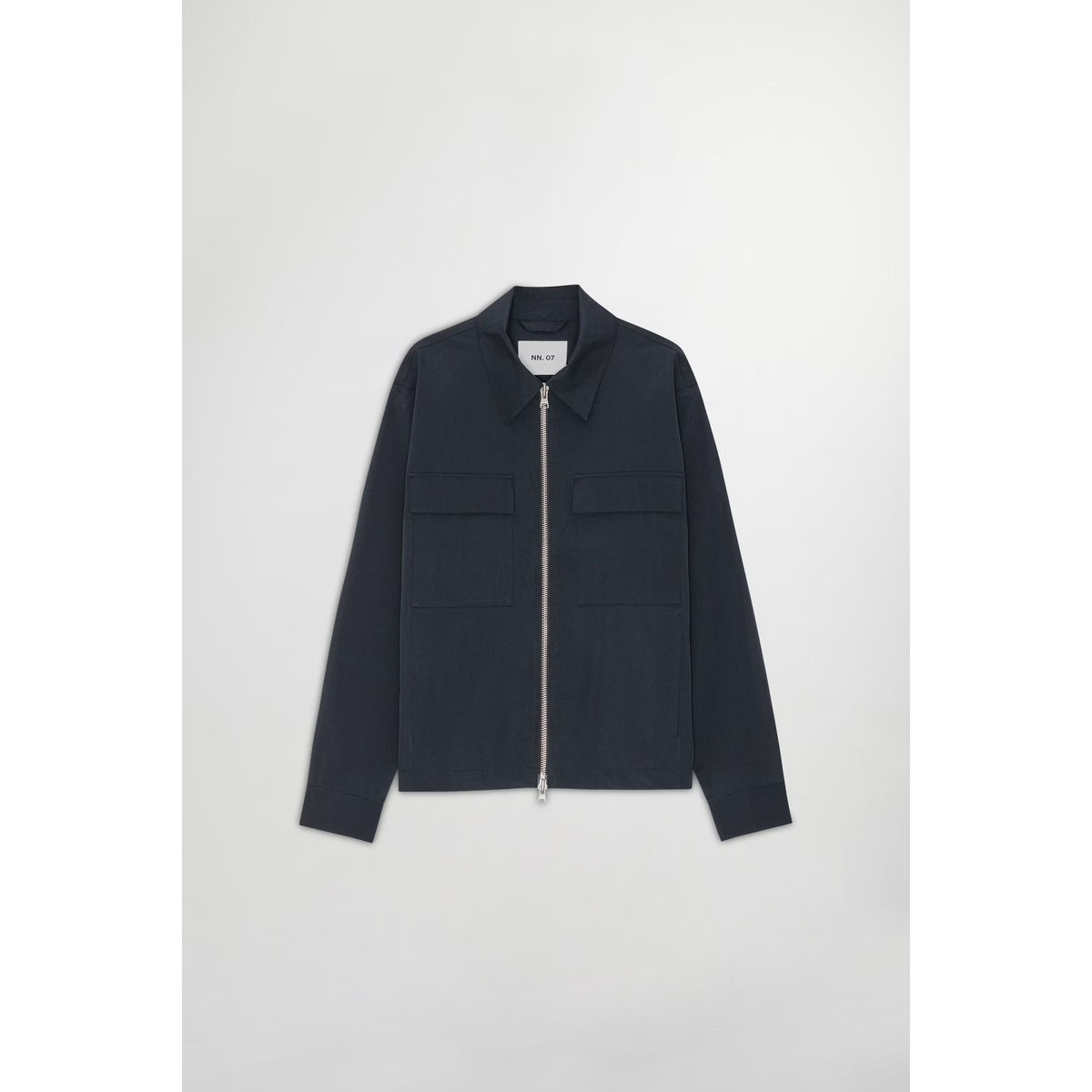 Men's navy blue Alban Technical Jacket by NN07, featuring a sleek design and technical fabric, shown on a model.