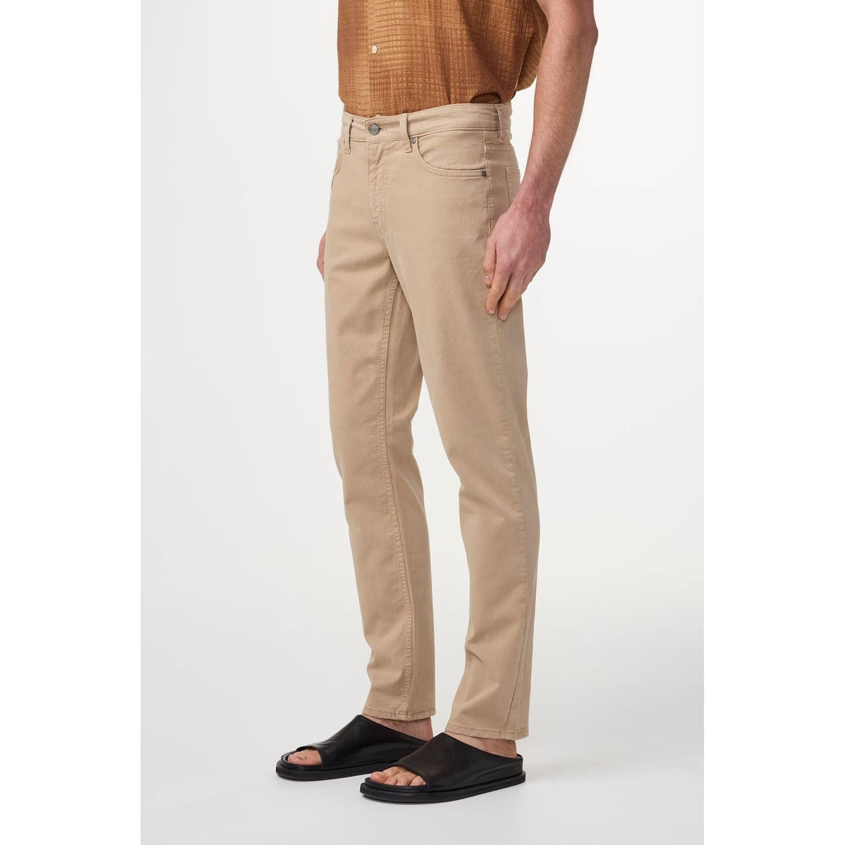 Men's NN07 Tony Classic Slim Fit Khaki Beige pants displayed on a hanger, showing the tailored fit and fabric details.