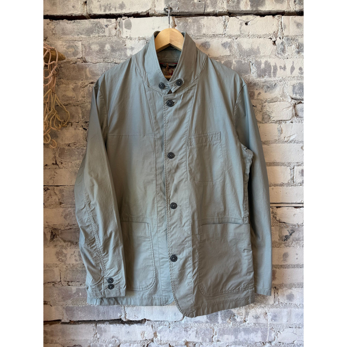 Men's Flyweight Flex Blazer in Light Steel by Relwen, showing a tailored steel-colored blazer with slim fit design.
