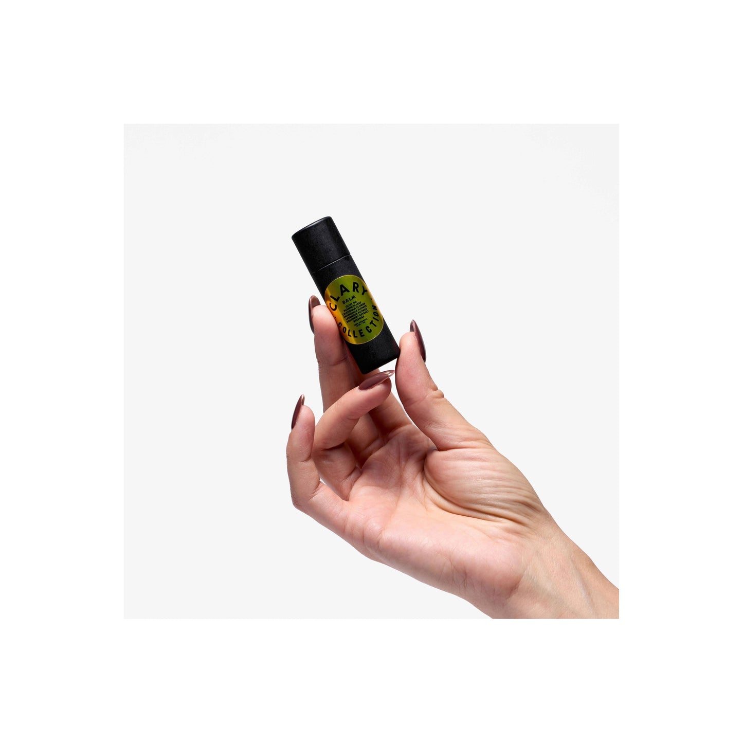 Clary Collection Olive Balm Stick in .3oz, a natural skincare accessory with a sleek, compact design for nourishing skin.
