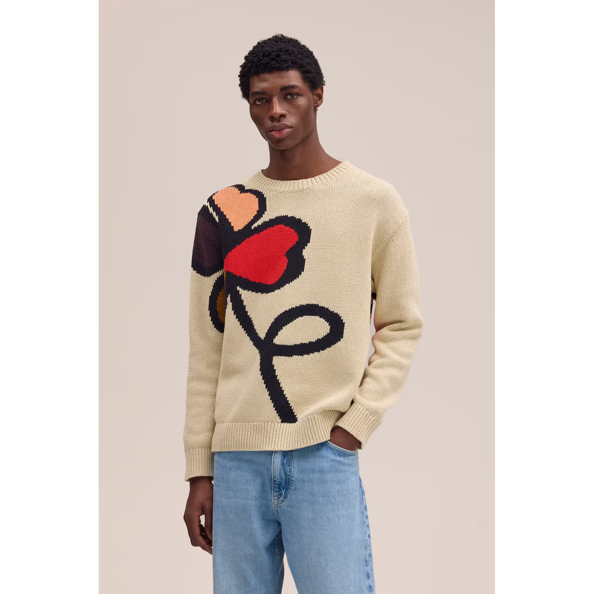 Men's NN07 Todd Sweater in ecru, showcasing a soft knit fabric and classic crew neck style for casual wear.