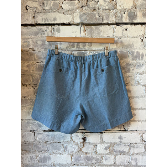 Women's Hartford Stefi linen chambray shorts in denim blue, casual fit with pockets and rolled hem detail.
