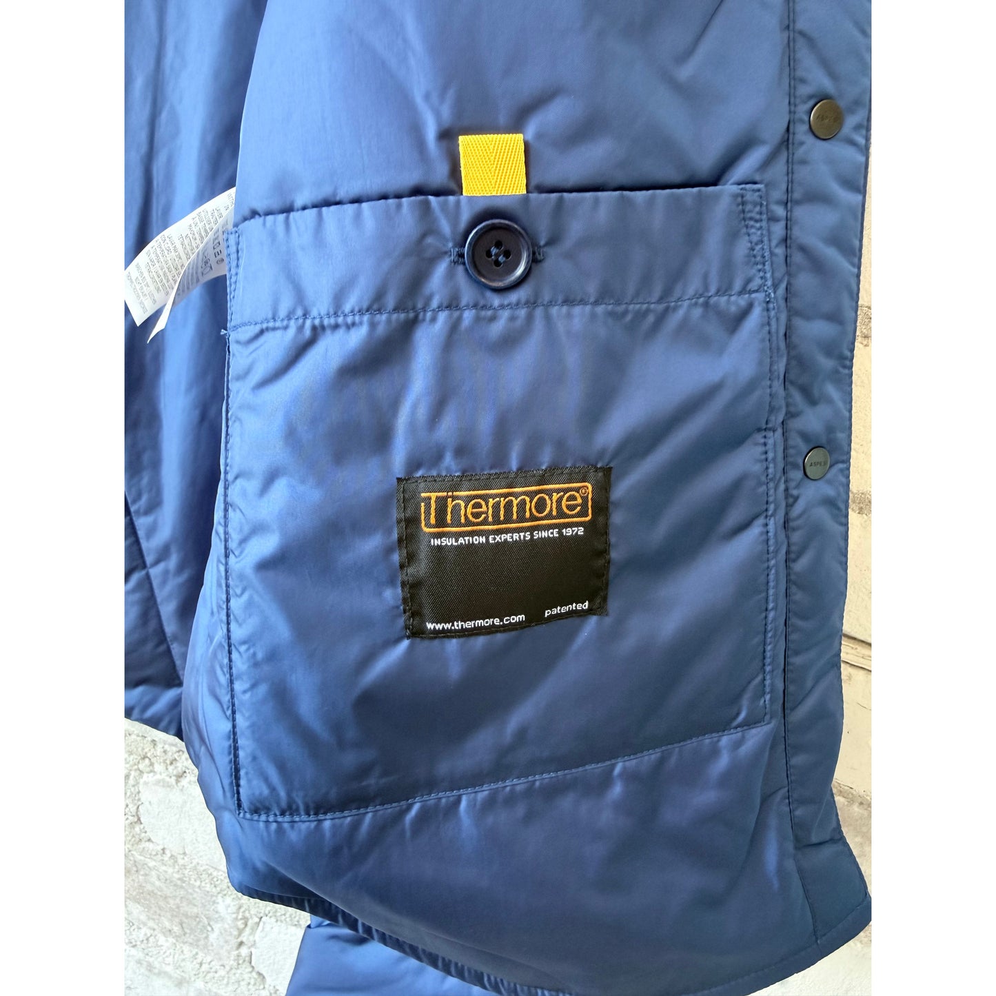 Light blue women's padded nylon overshirt by Aspesi featuring a relaxed fit and padded design, ideal for casual wear.
