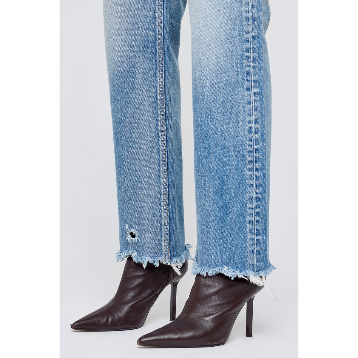 Light blue Moussy Mattapan Straight Low women's jeans displayed on a model.