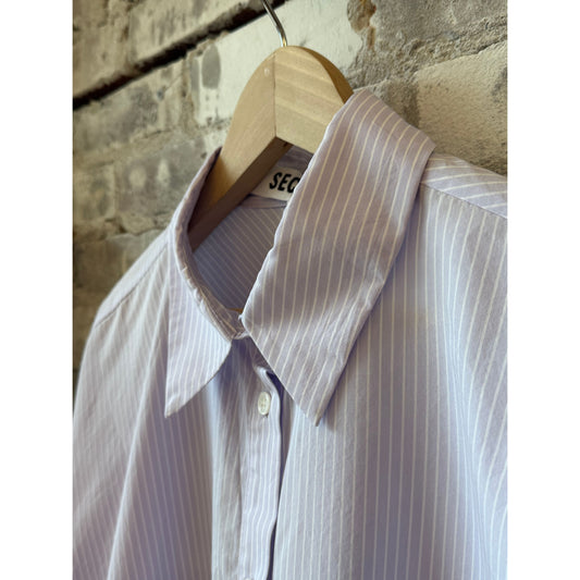 Women's Kelly Shirt Dress in lavender stripe by Secular, featuring a relaxed fit and button-down front.