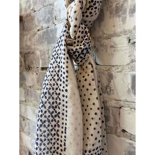 Light beige woven women's scarf with dot pattern from Hartford Women's, featuring a soft, stylish design for versatile wear.