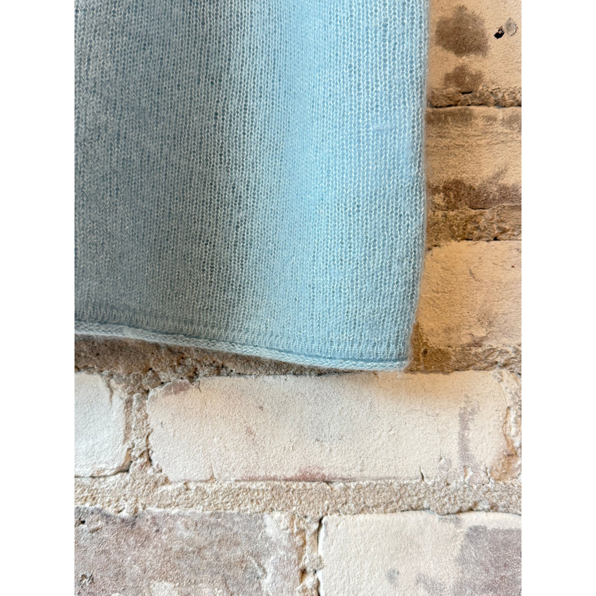 Women's cashmere silk crewneck sweater in Bleu Calanques by Majestic Filatures, showing the soft fabric and classic fit.