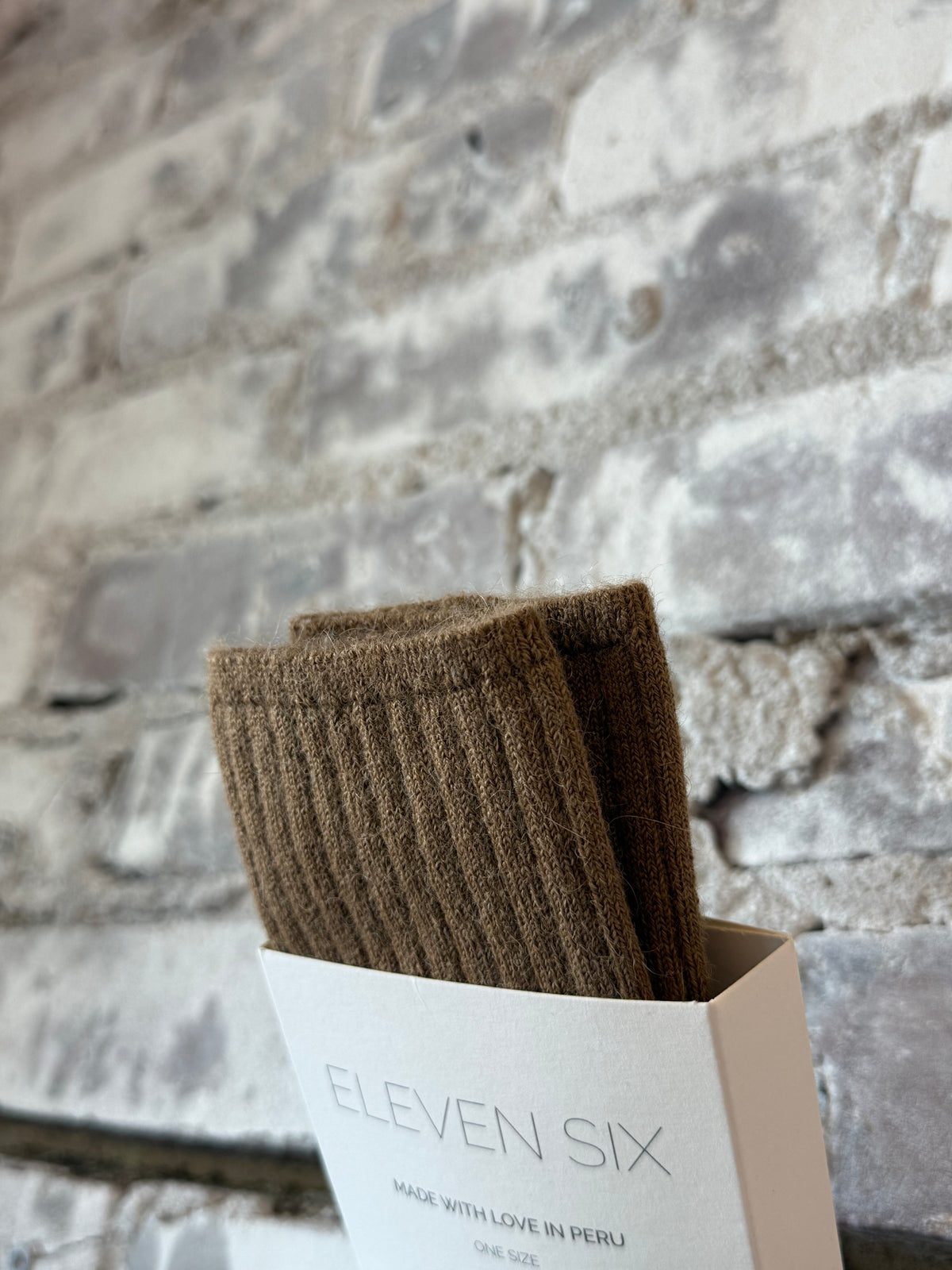 Women's Ali Ribbed Sock in camel from ELEVEN SIX, featuring a cozy ribbed knit texture and neutral color for casual wear.