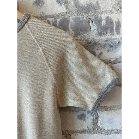 Men's Kepani Raffy Crew Neck SS Sweatshirt in oatmeal, soft cotton fabric, shown on a mannequin with long sleeves and a relaxed fit.