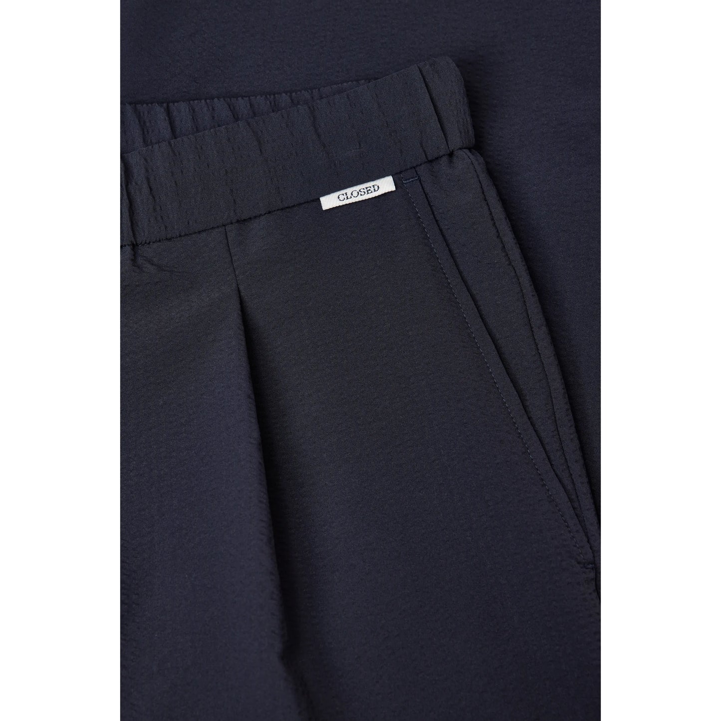 Men's Vigo Seersucker Pant in Dark Night by Closed Men's, featuring lightweight seersucker fabric and tailored fit for casual style.
