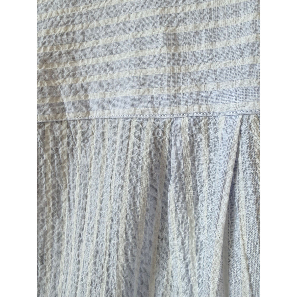 White and light blue woven women's shirt by Hartford Women's, featuring a classic collar and button-front design.