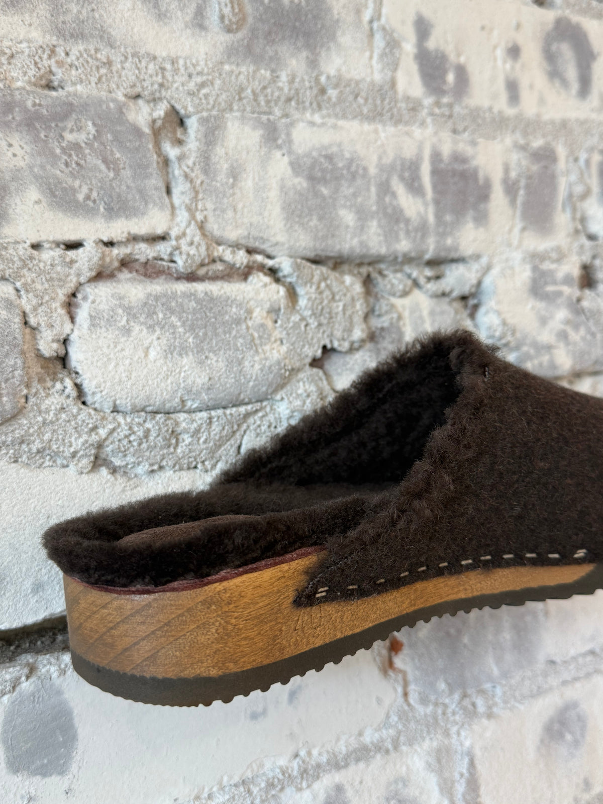 Dark brown women's Ella cashmere and lambswool clog by Kunsten Clogs, showcasing cozy, textured wool upper and sturdy sole.