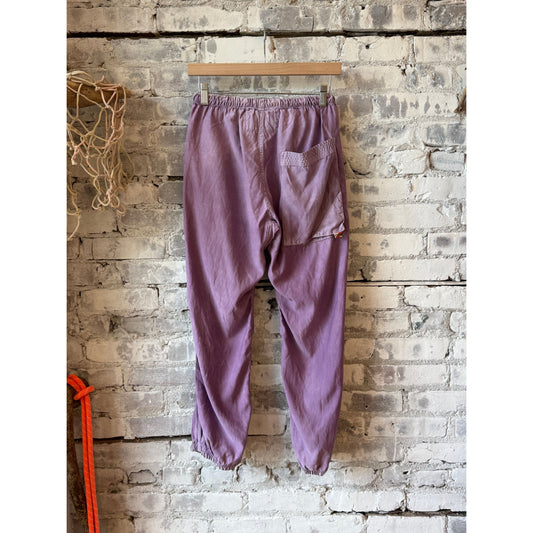 Women's Freecity Airjump Pant in matte satin, flap and snap-free design, in Bloom color, shown on a model.