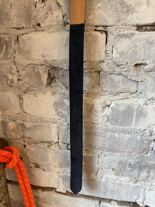 Men's navy suede calf O-ring belt by W. Kleinberg with a metal O-ring buckle and stitched edges.