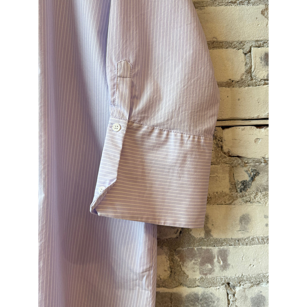 Women's Kelly Shirt Dress in lavender stripe by Secular, featuring a relaxed fit and classic collar, displayed on a model.