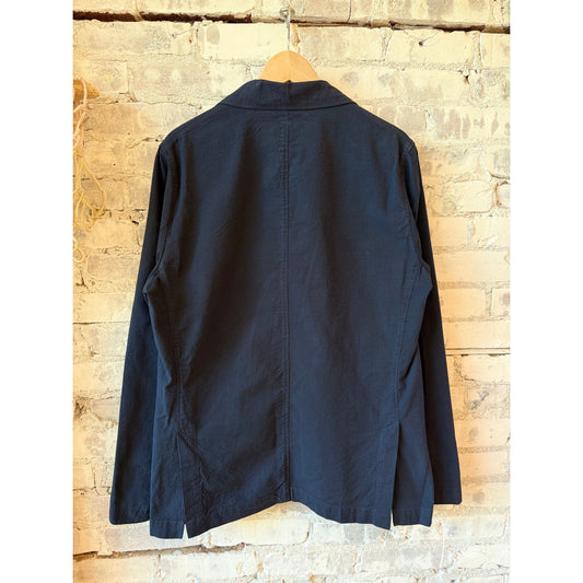 Men's Hartford Julian Woven Jacket in navy, showcasing textured woven fabric and classic collar design.