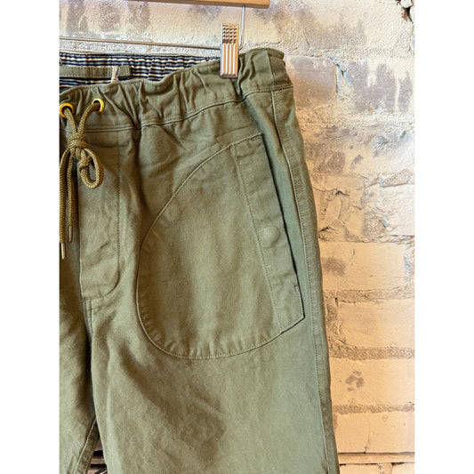 Men's olive premium deck shorts by Freenote Cloth, made from durable fabric with a relaxed fit and casual style.