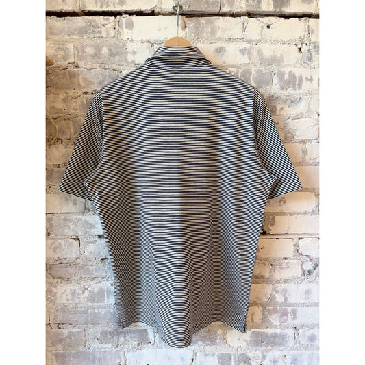 Men's navy and white striped knitted polo shirt by Hartford Men's, featuring a classic polo collar and short sleeves.