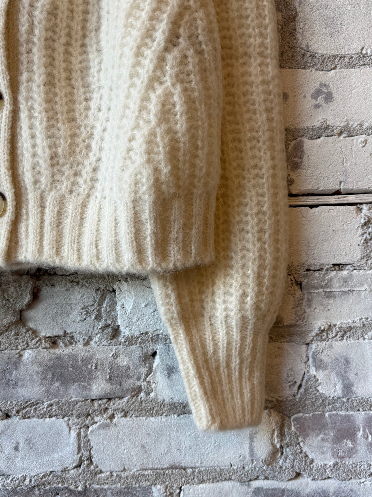 Women's ivory Sara Cardi by ELEVEN SIX, showing the lightweight knitted fabric and relaxed fit on a model.