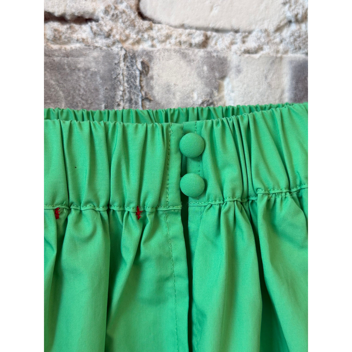 Women's scallop dress by Brazeau Tricot in Mojito color, featuring a stylish design with scalloped details and a flattering fit.