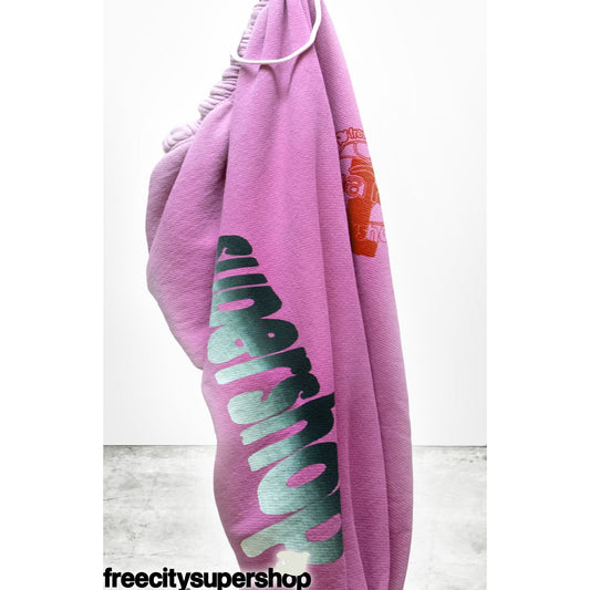 Women's pink sweatpants from Freecity's ARTYARD/SUPERSHOP SUPERVINTAGE YUMM OG collection, featuring a relaxed fit and soft fabric.