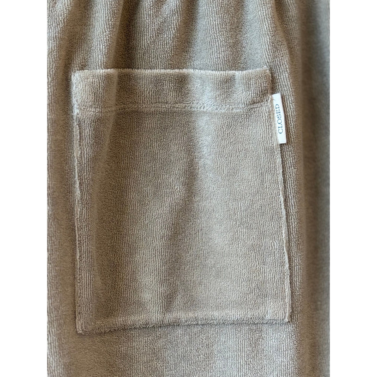 Men's Terry Cloth Shorts in Mud Grey by Closed Men's, showing the relaxed fit and soft terry fabric waistband.