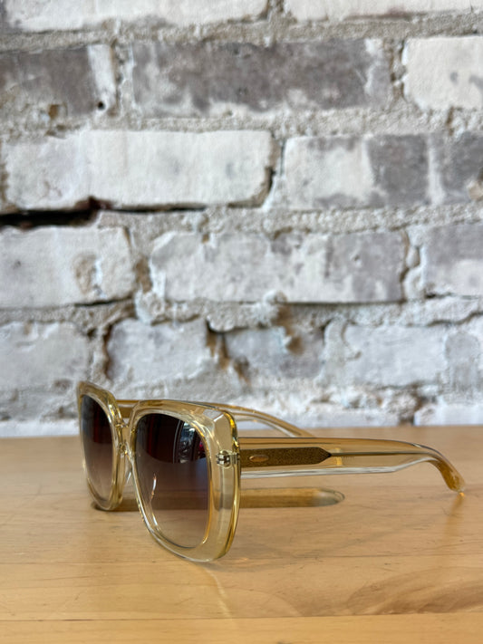 Women's Barton Perreira Yasmeen sunglasses in champagne frames with smokey topaz lenses, stylish and elegant eyewear.
