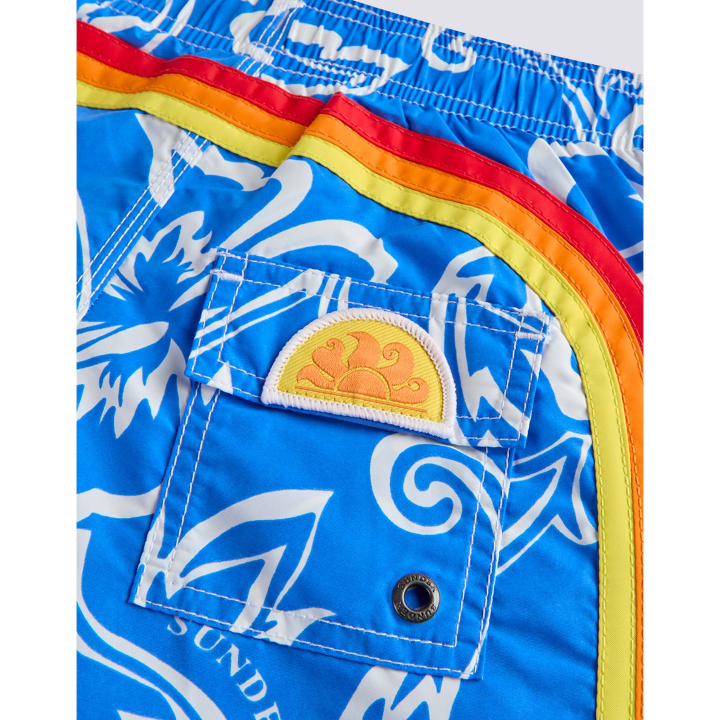 Men's Sundek Archive Hibiscus print elastic waist boardshort in vintage sapphire with floral pattern and side pocket details.