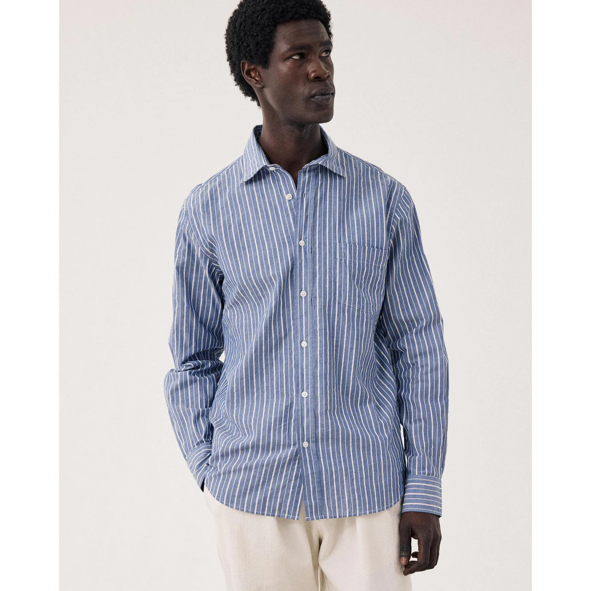Men's Paul Woven Shirt in blue dobby stripe by Hartford Men's, featuring lightweight fabric and classic button-down style.