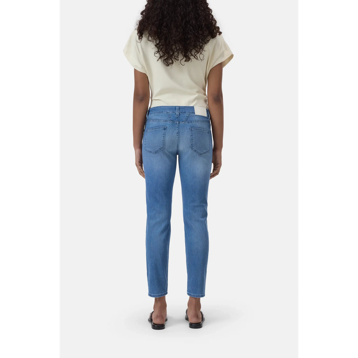 Women's Baker Power Stretch Skinny Jean in mid blue from Closed Women's, showing the fit and denim fabric detail.