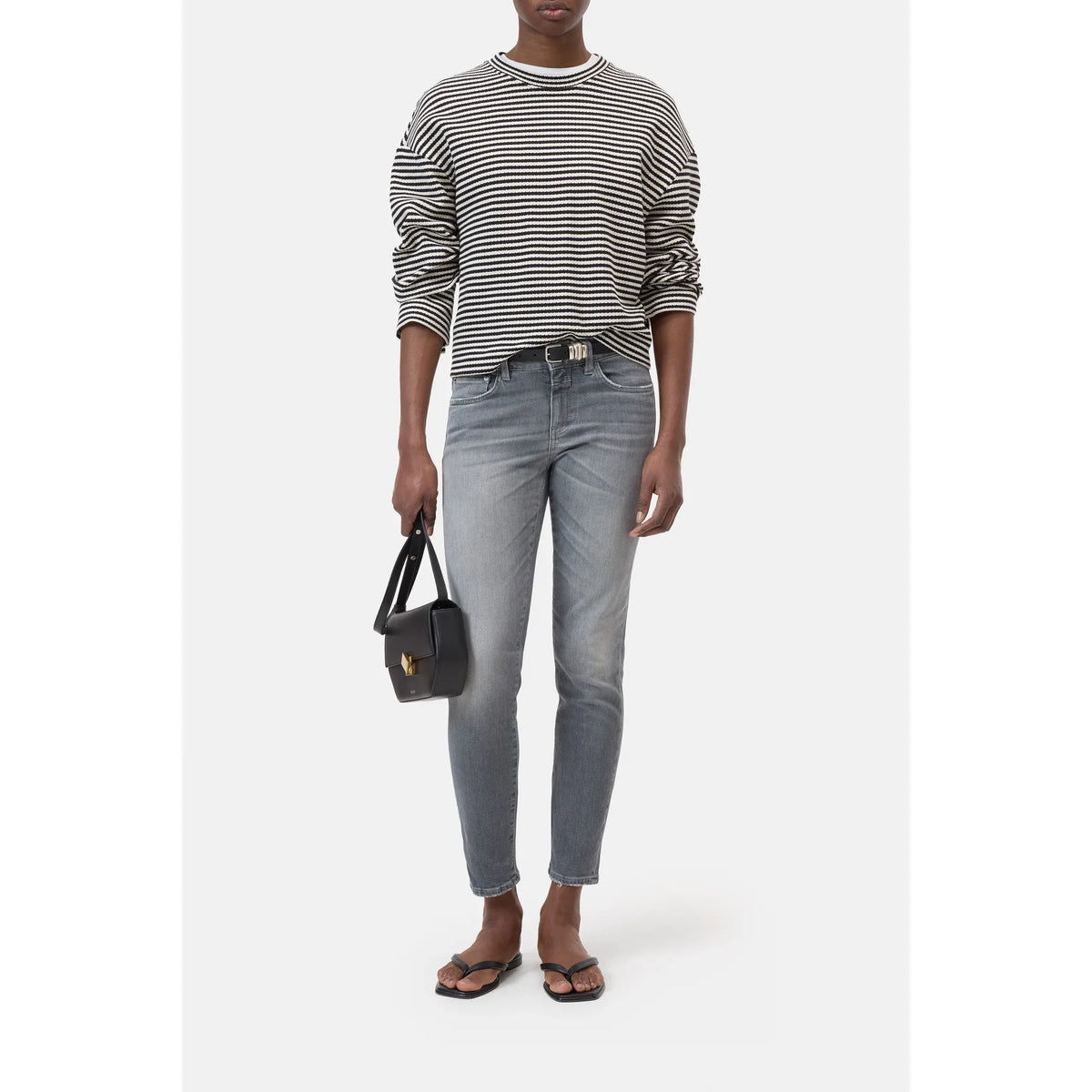 Closed Women's Baker Power Stretch Skinny Jeans in mid grey, showing a close-up of the fitted, high-rise denim with stretch fabric.