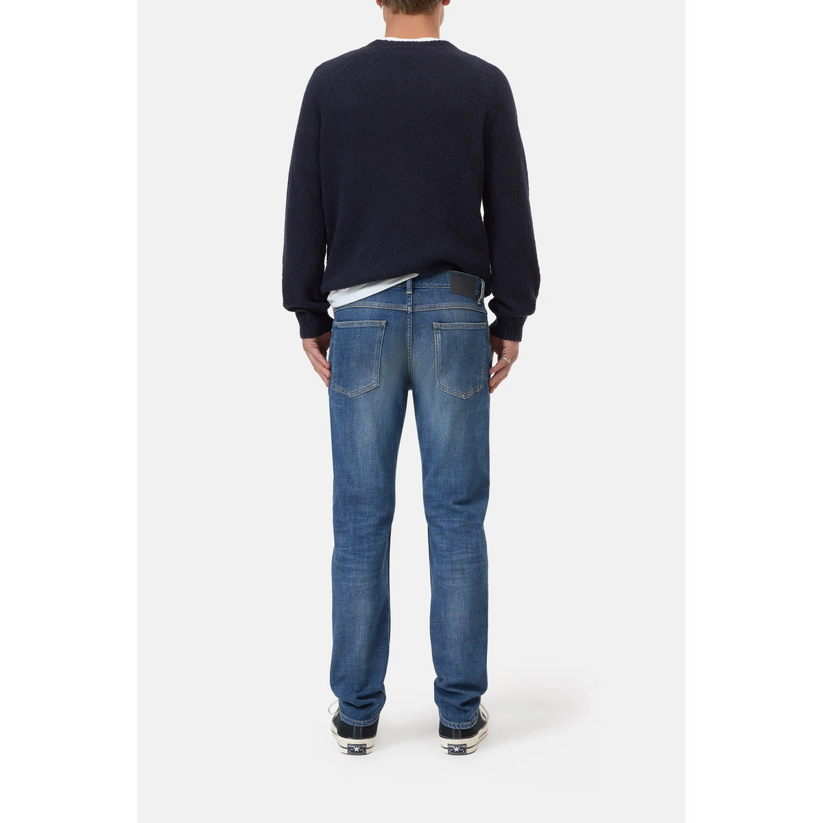 Men's Unity Slim Jean in mid blue denim by Closed Men's, featuring a fitted cut and classic five-pocket design.