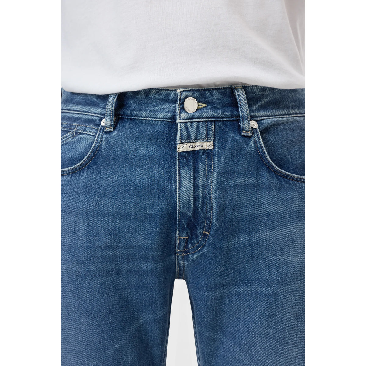 Men's Cooper True Regular Jean in mid blue by Closed Men's, showcasing classic fit and denim fabric with front and back pockets.