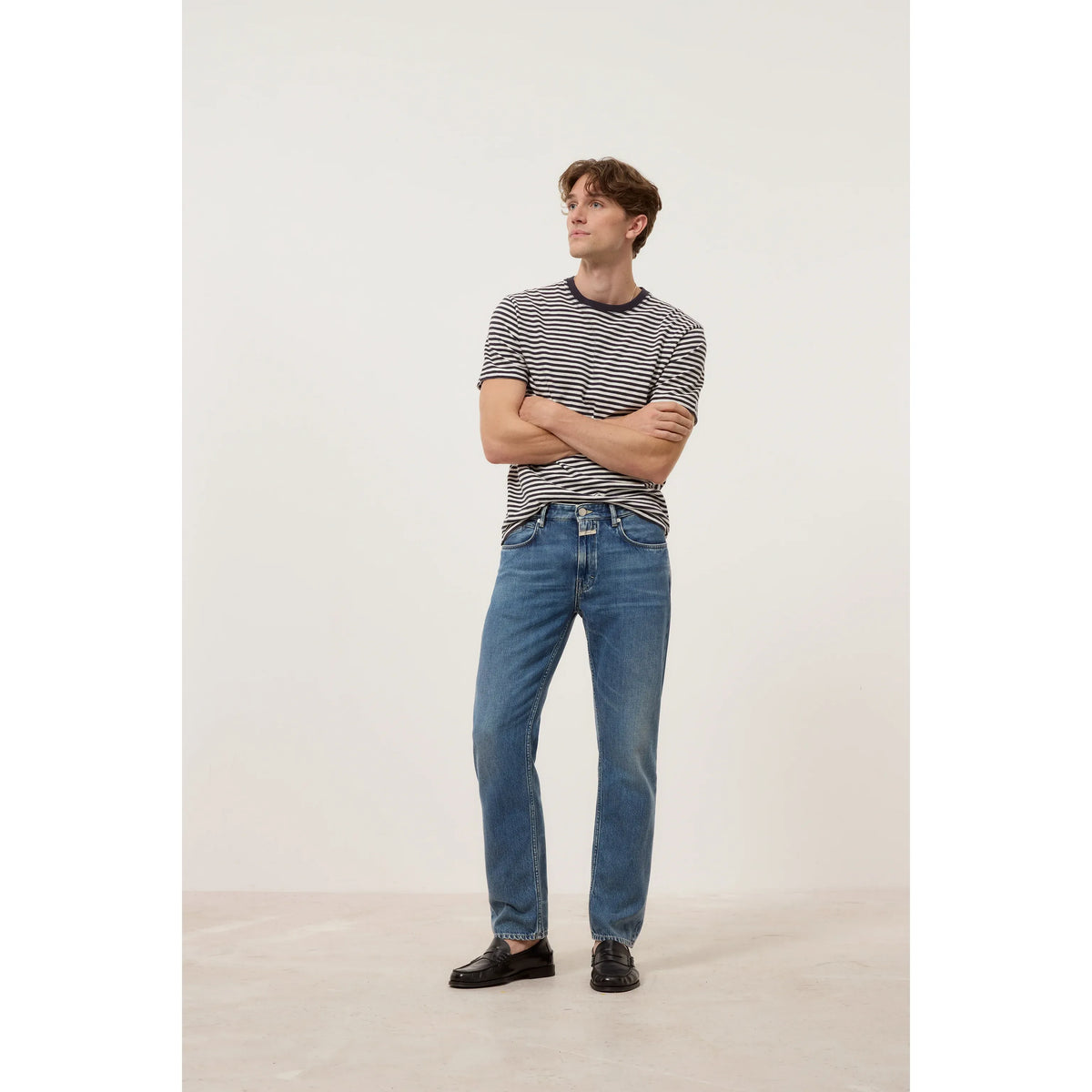 Men's Cooper True Regular Jean in mid blue denim by Closed Men's, featuring classic fit and authentic jean details.