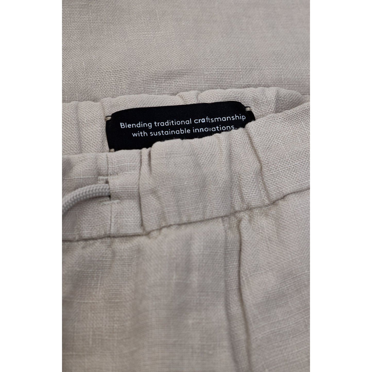 Men's Vigo tapered linen pants in mud grey by Closed Men's, featuring a relaxed fit and tapered leg design.