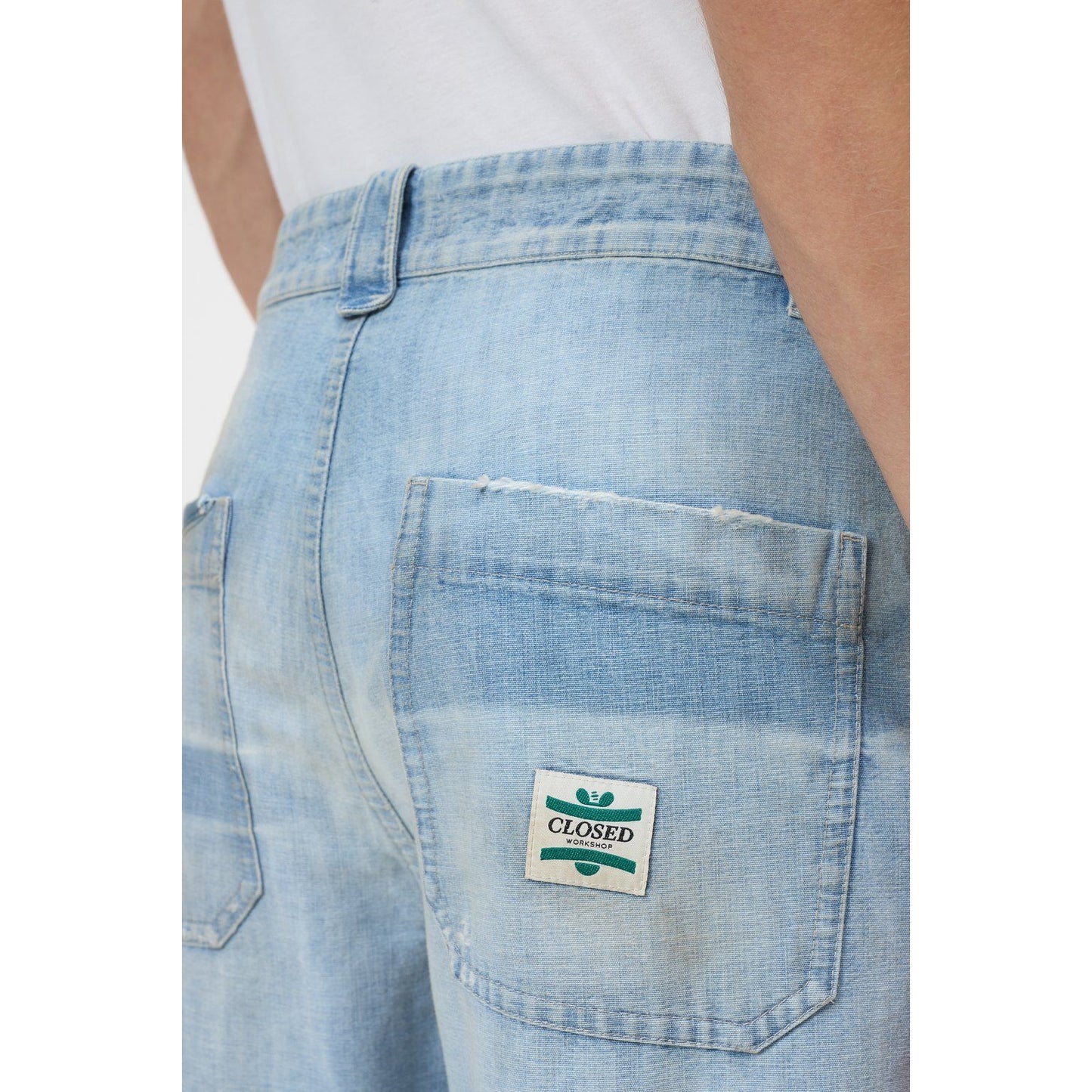 Light blue men's Toledo tapered relaxed jeans by Closed Men's, showing the fit and denim texture on a casual style.