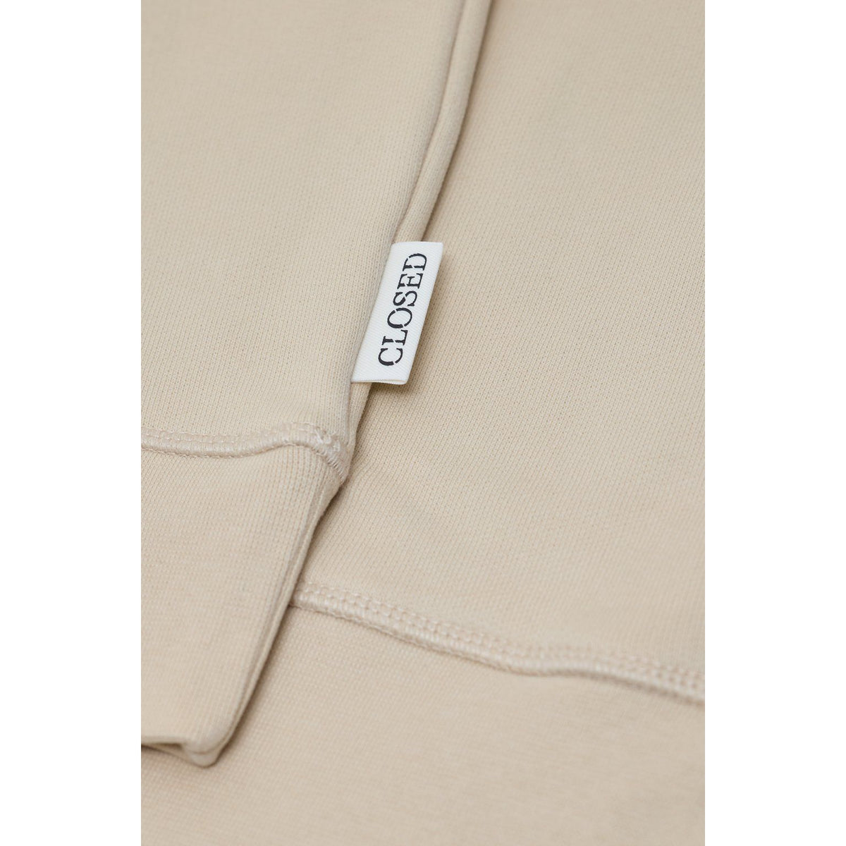 Men's Almond Cream crewneck sweatshirt by Closed Men's, showing the soft fabric and relaxed fit in a close-up view.