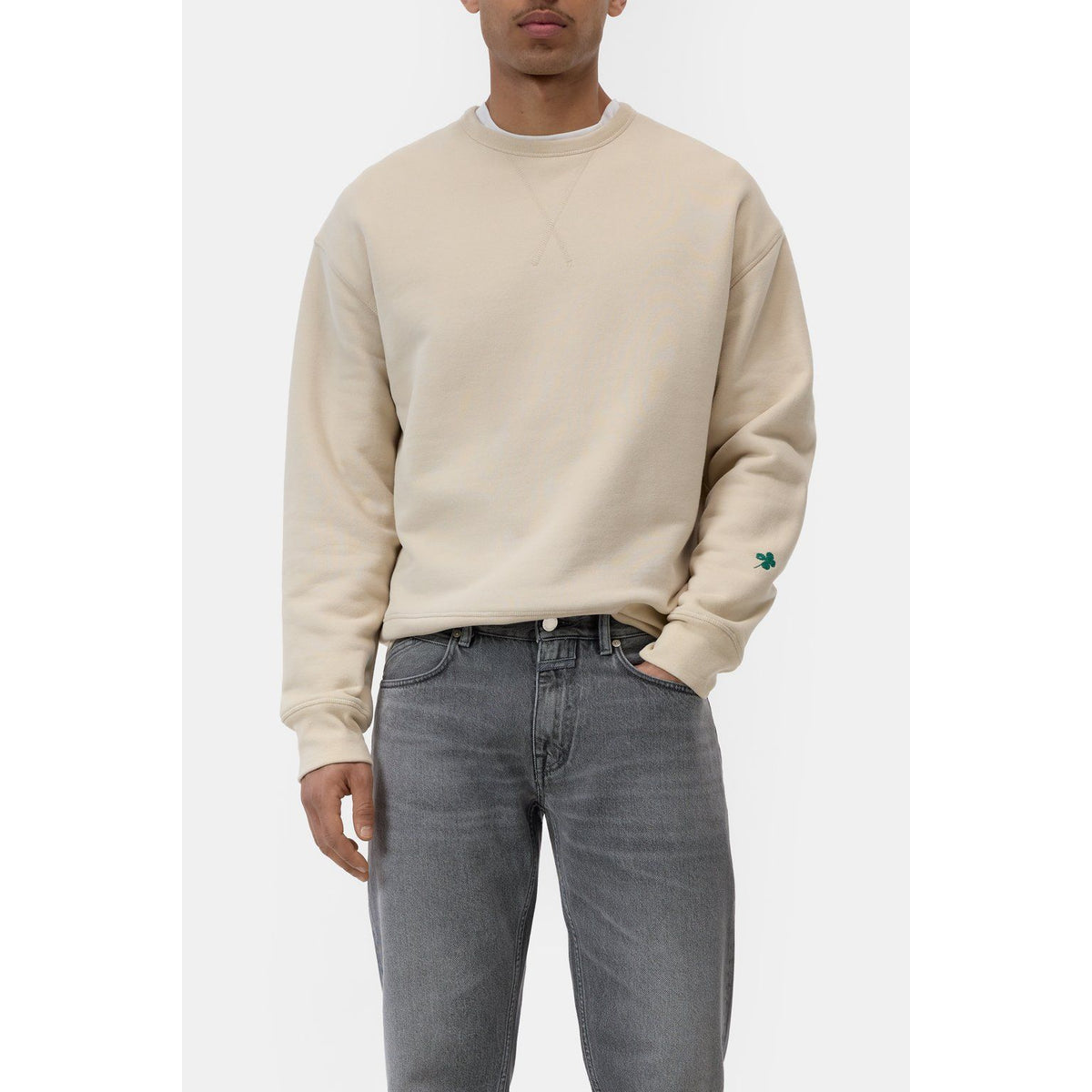 Men's Almond Cream crewneck sweatshirt by Closed Men's, showing a soft, casual fit with ribbed cuffs and classic crew neckline.