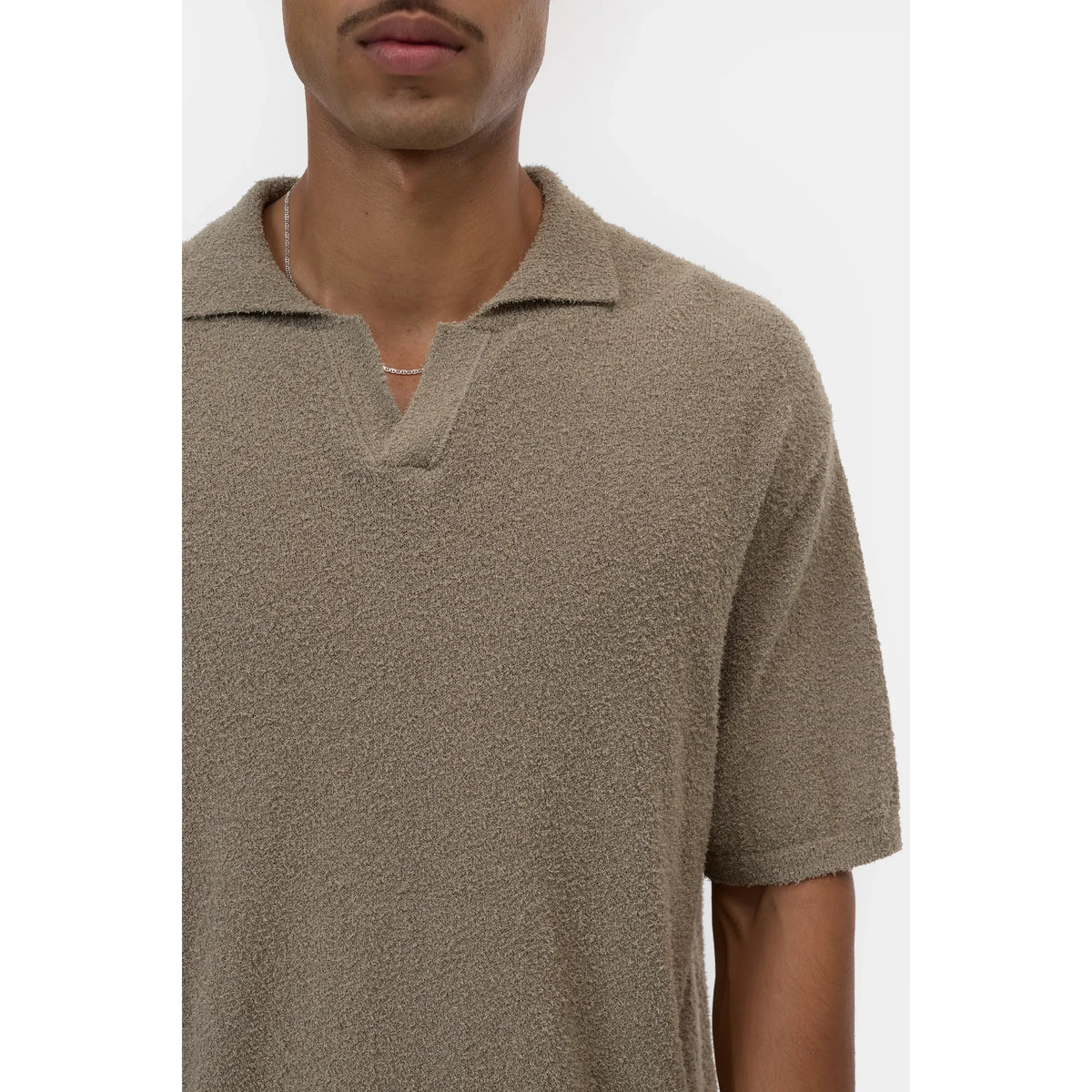 Men's Cotton Knit Polo in Pebble Green by Closed Men's, featuring a classic collared design and textured knit fabric.