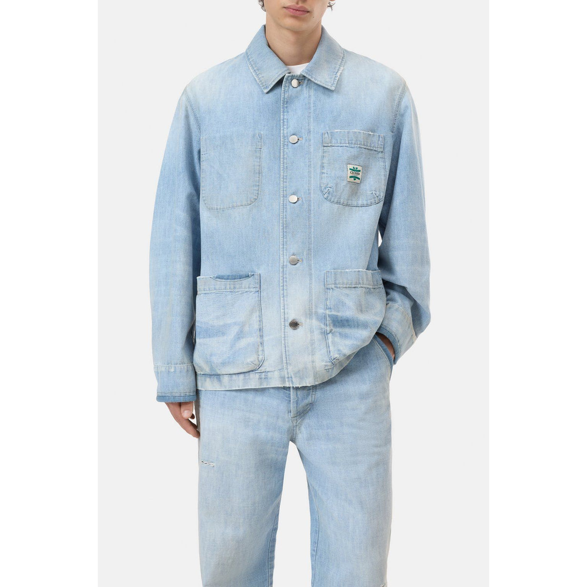 Light blue men's Worker Denim Jacket by Closed Men's, shown with front view and classic denim styling.