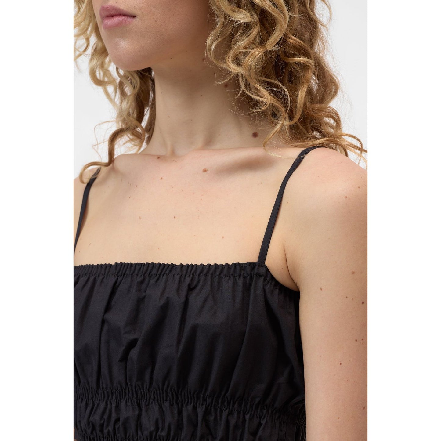 Women's gathered black top by Closed Women's, featuring a stylish, textured design and comfortable fit.
