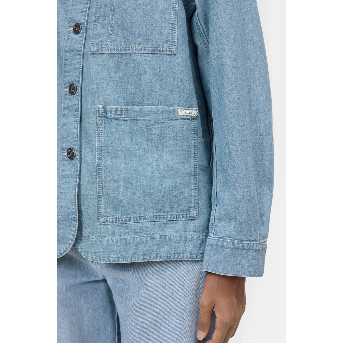 Light blue women's Worker Jacket by Closed Women's, shown in a front view with zipper and collar detail.
