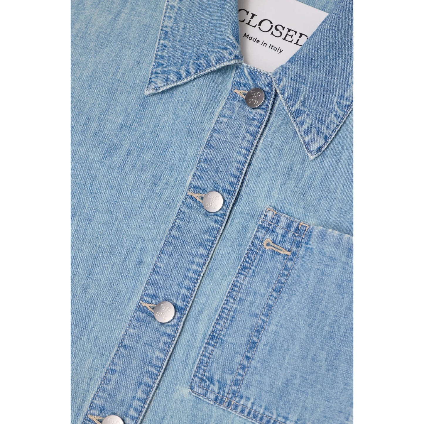 Light blue women's worker jacket by Closed Women's, shown hanging with front view and zip closure.