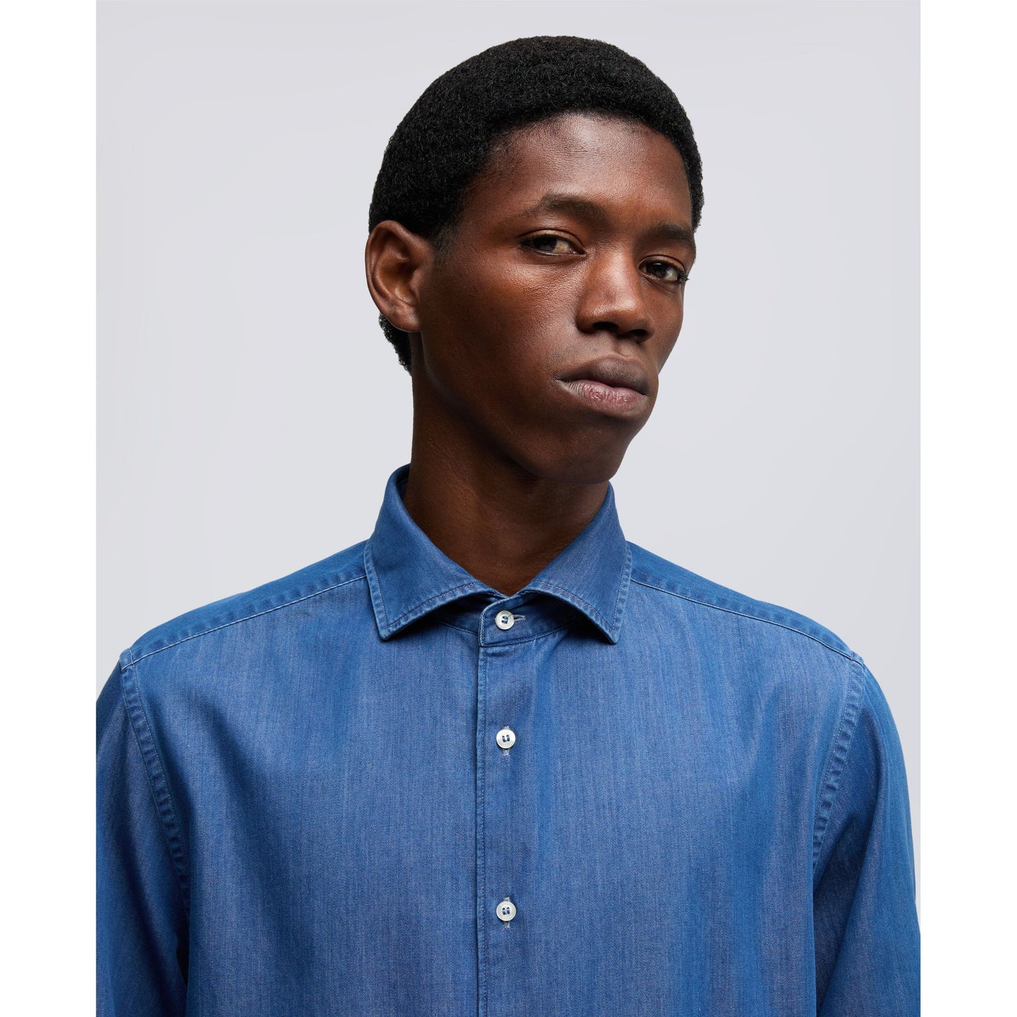 Men's Aspesi Vic Shirt in denim blue, featuring classic button-up design and long sleeves, ideal for casual and stylish outfits.